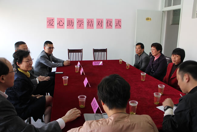 沪工党支部书记杨猛慷慨解囊，助力贫困学生实现大学梦