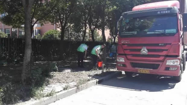 沪工阀门美丽华亭清洁家园志愿者活动(图1)